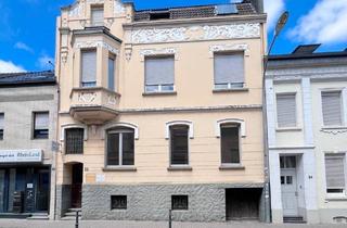 Wohnung kaufen in 41812 Erkelenz, Erkelenz - Sanierte Altbauwohnung mit eigener Terrasse in zentraler Lage