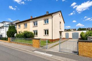 Einfamilienhaus kaufen in 63303 Dreieich, Dreieich - Modernisierungsbedürftige Doppelhaushälfte mit zwei Wohneinheiten und großem Grundstück in Dreieich-Sprendlingen!