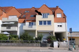 Wohnung kaufen in 65428 Rüsselsheim, Gemütliche Eigentumswohnung mit Balkon und Tiefgaragenstellplatz in gepflegtem Mehrfamilienhaus