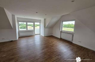 Wohnung kaufen in 63533 Mainhausen, BERK Immobilien - Moderne 2-Zimmer-Dachgeschosswohnung mit Balkon in Feldrandlage von Mainhausen-Zel