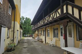 Haus kaufen in 96178 Pommersfelden, Großzügiges Mehrfamilienanwesen mit ehemaliger Gewerbefläche und Garage