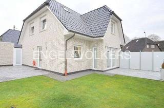 Einfamilienhaus kaufen in 26340 Zetel, Einfamilienhaus mit Garage und Garten in Zetel