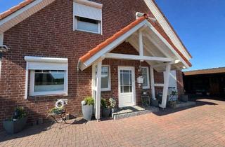 Einfamilienhaus kaufen in 23758 Oldenburg, Neuwertiges Einfamilienhaus mit Kamin, hochwertiger Ausstattung und großem Garten
