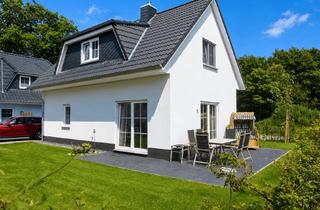 Haus kaufen in Am Kurpark 11, 18556 Breege, Charmantes Feriendomizil zwischen Breeger Hafen und Ostseestrand