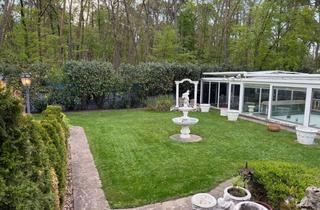 Haus kaufen in 63150 Heusenstamm, Luxuriöres Bungalow mit Pool und großen Gärten, Waldrandlage