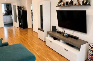 Wohnung kaufen in 82538 Geretsried, Moderne 3 Zimmer-Erdgeschoss-Wohnung mit hochwertiger Ausstattung, Terrasse und zwei TG-Stellplätze