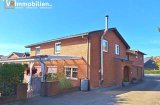 Einfamilienhaus kaufen in 25774 Lunden, Ensemble aus Mehrfamilienhaus & modernem Einfamilienhaus