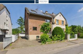 Einfamilienhaus kaufen in 51069 Köln, Wohnen am Gierather Wald: Doppelhaushälfte mit PV-Anlage und großem Garten