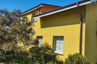 Haus kaufen in 16303 Schwedt, Schwedt (Oder) - Renditeobjekt mit Wohn- und Gewerbefläche | 322 m²