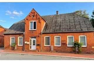 Haus kaufen in 25876 Schwabstedt, Charmantes Wohnhaus mit vermieteter Einliegerwohnung, gut gelegen in Schwabstedt. Investor-geeignet.