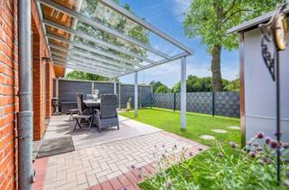 Doppelhaushälfte kaufen in 28816 Stuhr, Stilvolle Doppelhaushälfte mit sonnigem Garten und überdachter Terrasse