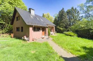 Einfamilienhaus kaufen in 42653 Gräfrath, Freistehendes Einfamilienhaus // Wohnen in Natur und Ruhe mit Doppelgarage