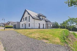 Haus kaufen in 54597 Fleringen, Erstbezug! Großzügiger Neubau im schönen Eifelort Fleringen zu verkaufen!