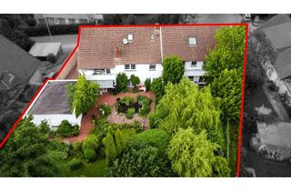 Mehrfamilienhaus kaufen in 32602 Vlotho, Immobilienpaket: Großzügige Hauptwohnung, Mehrfamilienhaus und Grundstück