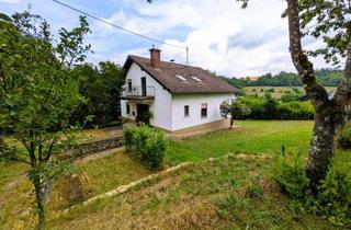 Einfamilienhaus kaufen in 54636 Mülbach, Freistehendes Einfamilienhaus mit 2 Garagen & großem Naturgarten in ruhiger Ortsrandlage von Mülbach