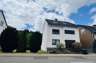 Mehrfamilienhaus kaufen in 66663 Merzig, Mehrfamilienhaus in Merzig inklusive unbebautem Nebengrundstück (baulich erschlossen)
