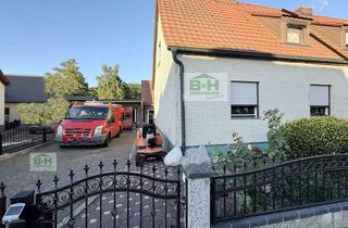 Anlageobjekt in 06766 Bitterfeld-Wolfen, Kapitalanlage mit 6,7 % Bruttorendite – vermietete Doppelhaushälfte auf 980 m² Grundstück