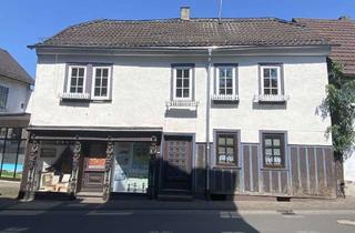Haus kaufen in 63679 Schotten, Attraktive Rendite - Denkmalgeschütztes Wohn- und Geschäftshaus in zentraler Lage von Schotten