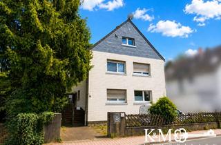 Mehrfamilienhaus kaufen in 65843 Sulzbach, Gepflegtes Mehrfamilienhaus mit drei Wohneinheiten und großem Garten in begehrter Lage