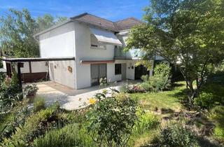 Wohnung kaufen in 55283 Nierstein, Stilvolle Eigentumswohnung mit traumhaftem Garten und großer Terrasse in Nierstein