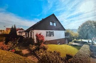 Einfamilienhaus kaufen in 34327 Körle, Körle - Einfamilienhaus mit vermieteter Dachgeschosswohnung