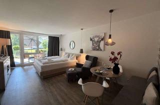 Wohnung kaufen in 83727 Schliersee, Ferienappartement mit Gartenblick – Ihr Rückzugsort im Grünen