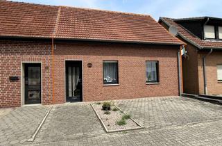 Einfamilienhaus kaufen in 48607 Ochtrup, Reihenendhaus in Ochtrup mit überraschenden Möglichkeiten!