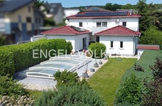 Einfamilienhaus kaufen in 56170 Bendorf, Hochwertiges Einfamilienhaus im Atrium-Bungalowstil in begehrter Blicklage mit Pool und PV-Anlage