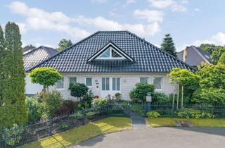 Einfamilienhaus kaufen in 26907 Walchum, Hochwertiges Einfamilienhaus mit Wintergarten, Kamin und traumhaftem Garten in ruhiger Wohnlage v...