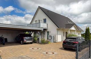Haus kaufen in 24848 Kropp, Modern & Energieeffizient | A+ Zweifamilienhaus | KfW 55 | Ruhige Feldrandlage | Ebenerdig Wohnen...