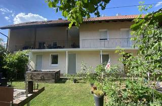 Haus kaufen in 97776 Eußenheim, Gepflegtes Zweifamilienhaus in Eußenheim mit Ausbaureserve im Dachgeschoss