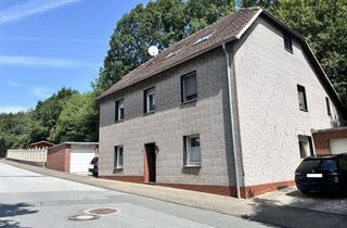 Einfamilienhaus kaufen in 33142 Büren, Zweigeschossiges Einfamilienhaus mit Werkstatt und Lagerräumen in massiver Bauweise in Büren-Ahden!