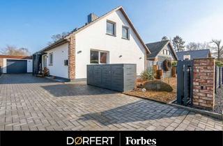 Einfamilienhaus kaufen in 25746 Heide, Modernisiertes und großzügiges Einfamilienhaus mit Gartenidylle