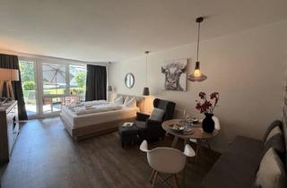 Wohnung kaufen in 83727 Schliersee, Ferienappartement mit Gartenblick – Ihr Rückzugsort im Grünen