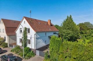 Einfamilienhaus kaufen in 35423 Lich, Viel Platz für die ganze Familie - Einfamilienhaus mit großem Grundstück in Lich