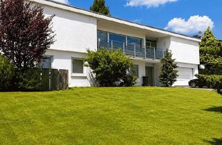Haus kaufen in 35075 Gladenbach, Gladenbach - Einmaliger Designer-Bungalow mit eingewachsenem Garten - Bestlage