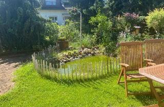 Wohnung kaufen in 64319 Pfungstadt, Pfungstadt - Wohnung mit gr. Garten u.Teich in Pfungstd.zu verkaufen