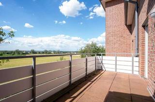 Wohnung kaufen in 31700 Heuerßen, Fernblick inklusive: Gepflegte 3,5-Zimmer-Eigentumswohnung mit Balkon, Aufzug & EBK