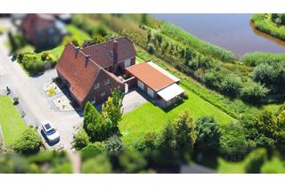 Haus kaufen in 26639 Wiesmoor, Zweifamilienhaus in ruhiger, zentraler Sackgassenlage der Blumenstadt Wiesmoor