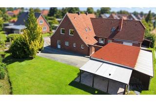 Haus kaufen in 26639 Wiesmoor, Zweifamilienhaus in ruhiger, zentraler Sackgassenlage der Blumenstadt Wiesmoor