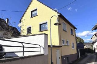 Haus kaufen in 53533 Antweiler, Ferienhaus oder Zuhause? Vielseitige Immobilie mit Terrasse in Antweiler
