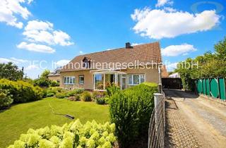 Einfamilienhaus kaufen in 06886 Lutherstadt Wittenberg, großzügiges EFH mit Werkstatt, Nebengelass und 4.755 m² Grundstück in Wittenberg OT Apollensdorf