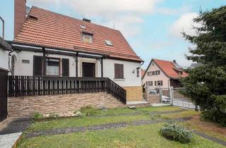 Einfamilienhaus kaufen in 97222 Rimpar, Charmantes Einfamilienhaus mit Innenhof, Garten & viel Potenzial in Rimpar