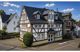 Anlageobjekt in 57299 Burbach, Wohnen und Arbeiten vereint: Charmantes Fachwerkhaus mit Gewerbeeinheit