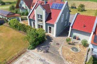 Haus kaufen in 96158 Frensdorf, Freistehendes Einfamilienwohnhaus mit Komfortgarage und Garten in Ortsradlage