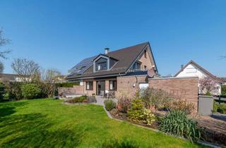 Haus kaufen in 46539 Dinslaken, TOP-Lage in Dinslaken-Hiesfeld: Zweifamilienhaus mit liebevoll angelegtem Garten und Dachterrasse