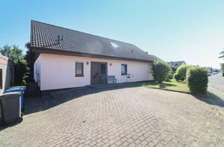 Einfamilienhaus kaufen in 35447 Reiskirchen, Flexibles Zweifamilienhaus mit großem Garten – ideal für Generationen, Wohnen & Vermieten
