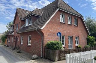 Wohnung kaufen in 25938 Wrixum, Erdgeschosswohnung in Wrixum mit Garten, Garage und PKW-Stellplatz