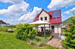 Einfamilienhaus kaufen in 37308 Heilbad Heiligenstadt, Modernes Einfamilienhaus mit idyllischem Garten und Garage in Heilbad Heiligenstadt