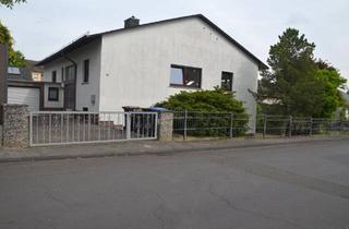 Haus kaufen in 35633 Lahnau, Lahnau - Lichtdurchflutetes Ein-Zweifamilienhaus mit traumhaftem Garten
